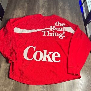 Coca Cola Vibrant Red Long Sleeve Spirit Jersey Tee with Back White Text
